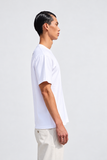 T-shirt Signature blanc Raconter Paris, vue de profil montrant la coupe droite et le col rond